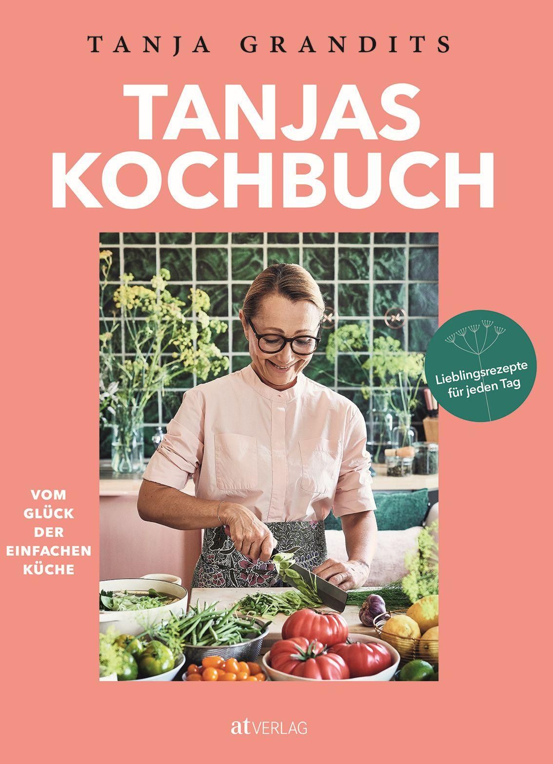Buchcover: "Tanjas Kochbuch". Frau schneidet Gemüse. Titel in Großbuchstaben. Aufkleber: Lieblingsrezepte für jeden Tag. Verlag: at Verlag.