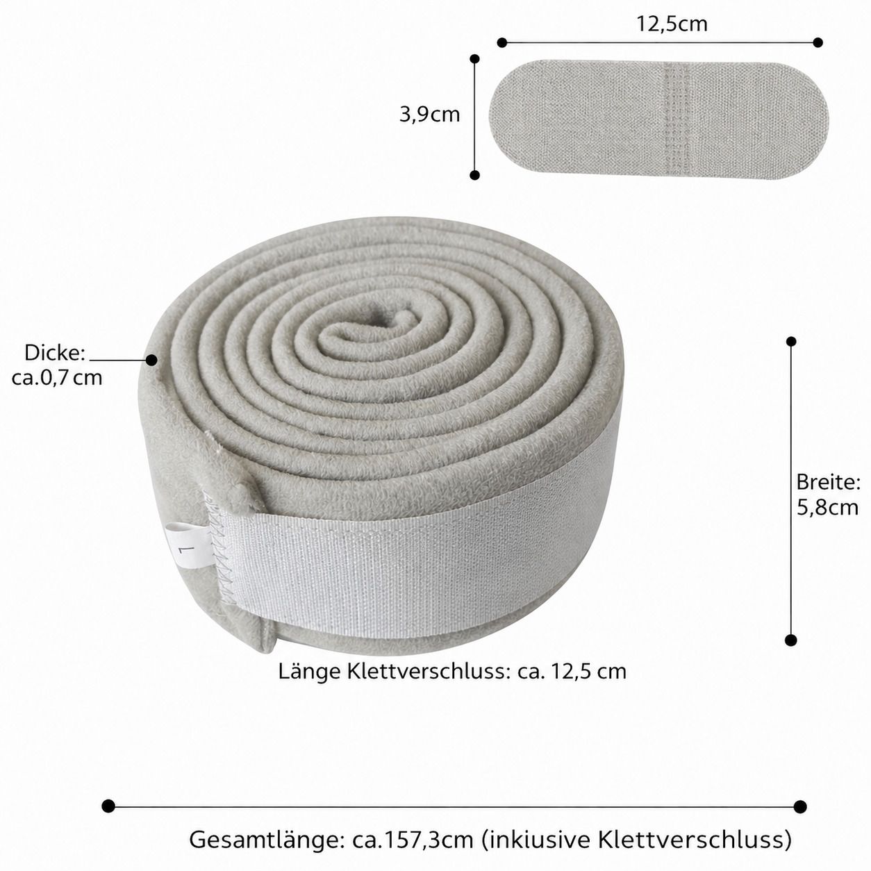 Graue Armschlinge, gerollt, mit Klettverschluss. Maße: 157,3 cm Gesamtlänge, 5,8 cm Breite, 0,7 cm Dicke. Klettverschluss 12,5 cm.