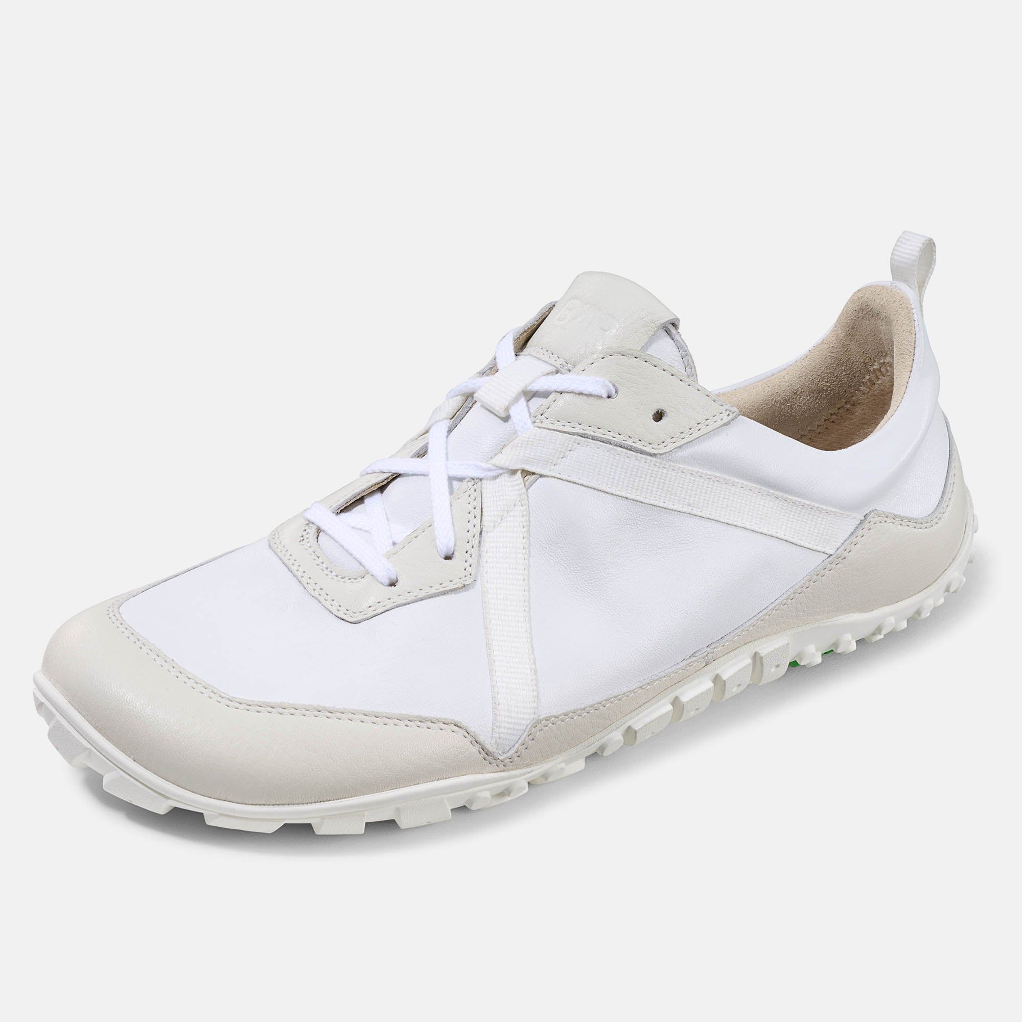 Weißer Schnürschuh. Beige Sohle und Details. Schnürsenkel. Leichte Textur auf der Sohle.