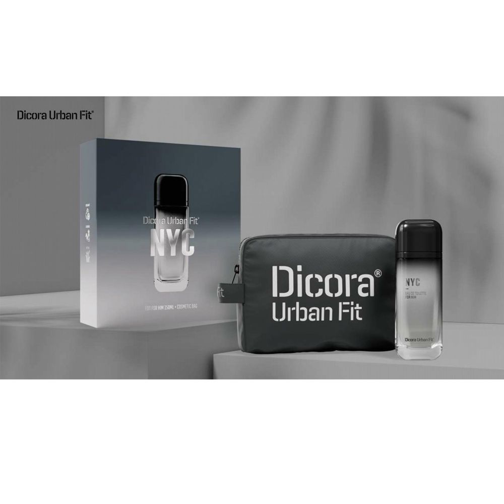 Graue Geschenkbox, Kosmetiktasche und Flakon. Auf der Box und Tasche steht "Dicora Urban Fit". Der Flakon hat einen schwarzen Deckel und die Aufschrift "NYC".