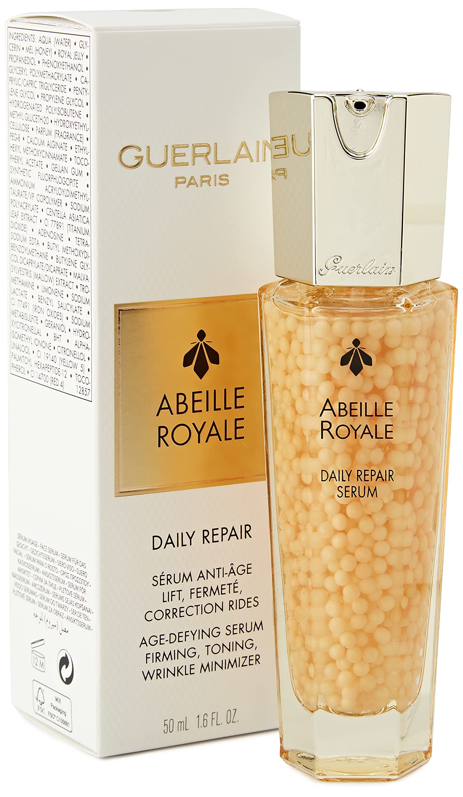 Serumflasche und Verpackung. Aufschrift: Abeille Royale, Daily Repair Serum. Marke: Guerlain.