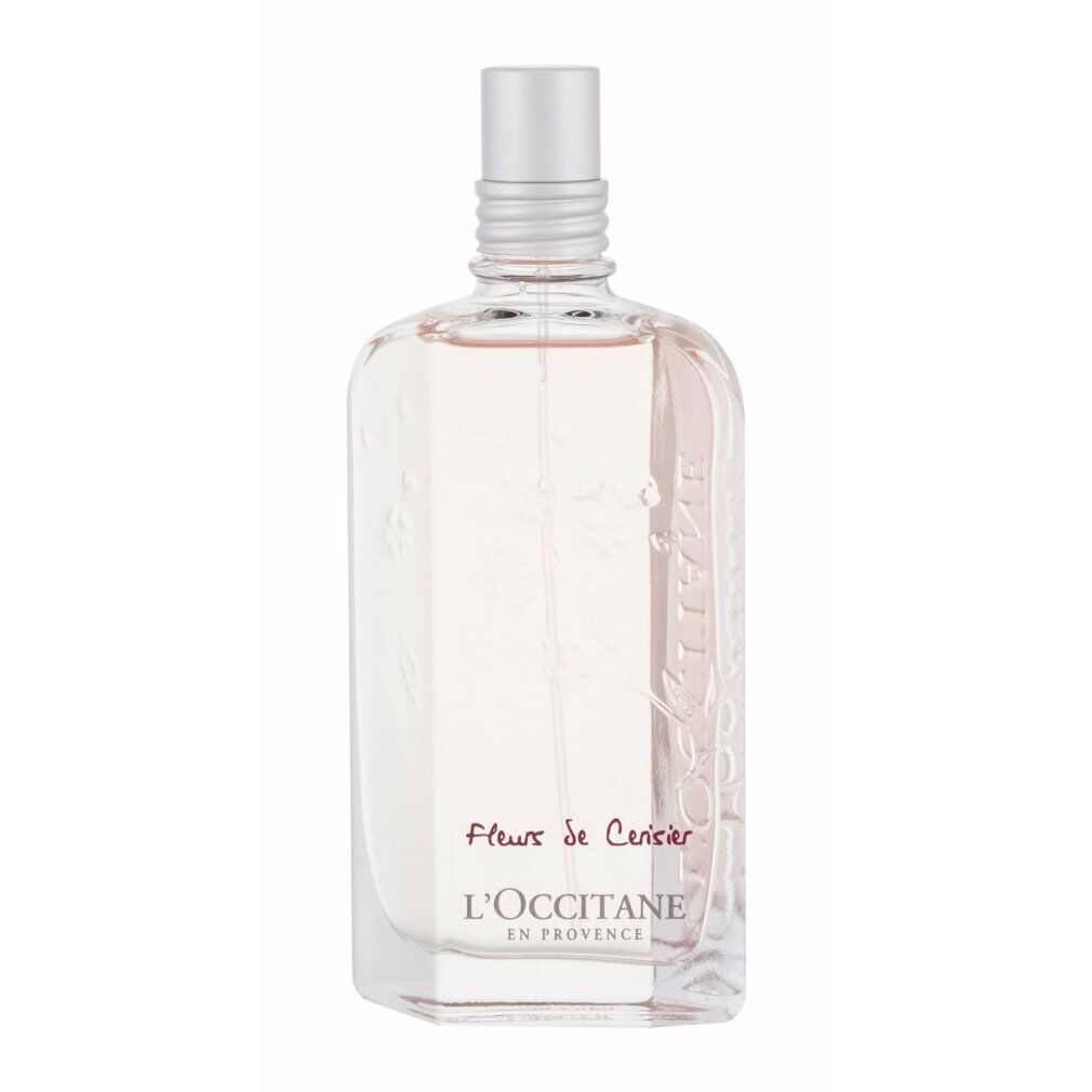 Klarer Flakon mit rosa Flüssigkeit. Silberner Verschluss. Aufschrift: L'Occitane, Fleurs de Cerisier.