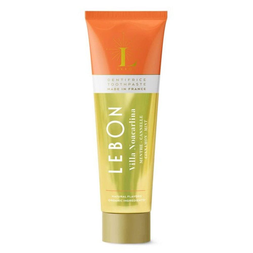 Zahnpasta-Tube LEBON Villa Noacarlina. Orange-gelbe Tube mit Schriftzug und Logo. Aufschrift: Menthe-Cannelle-Mint.