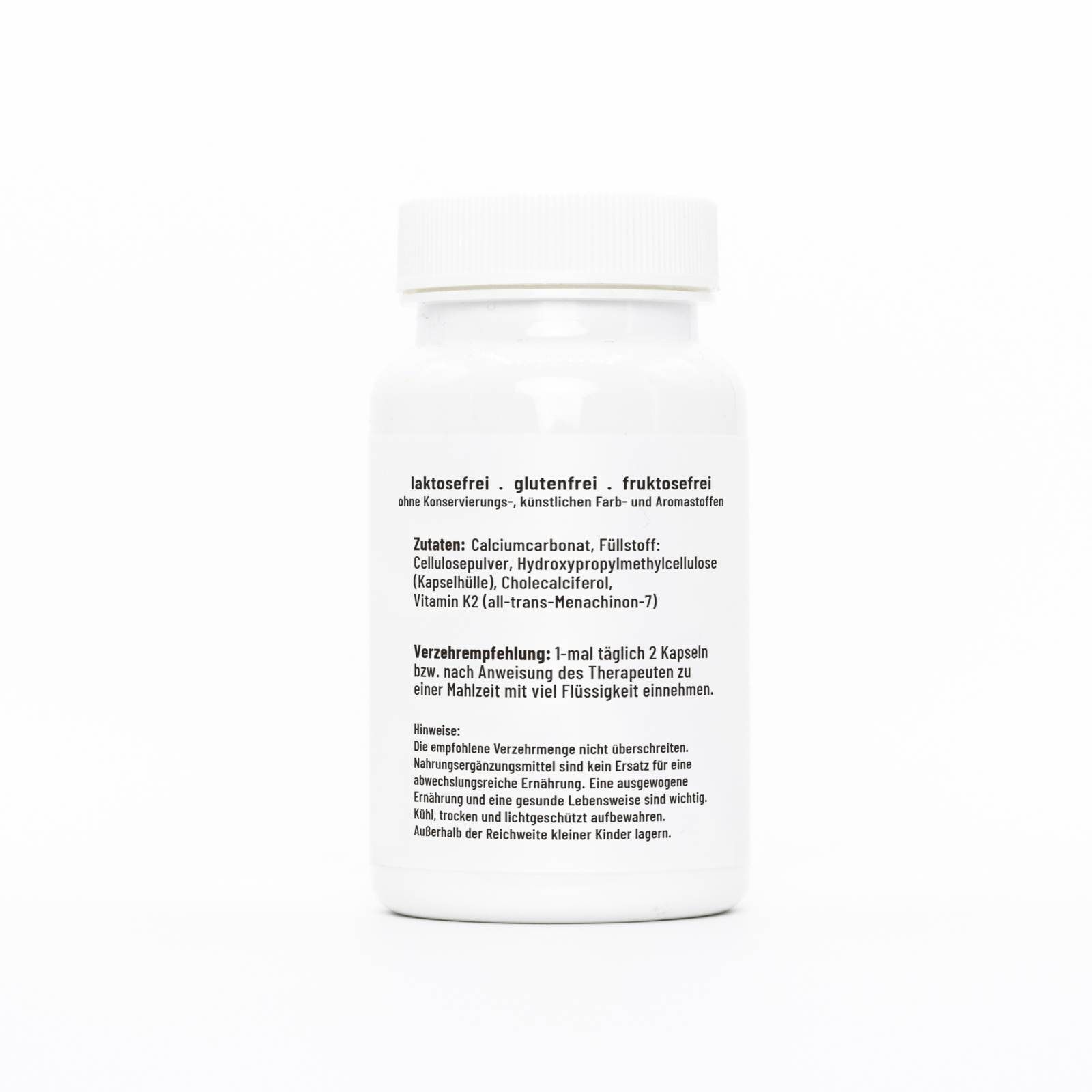 Rückseite der weißen Flasche. Text: laktosefrei, glutenfrei, fruktosefrei. Zutatenliste: Calciumcarbonat, Füllstoff, etc.