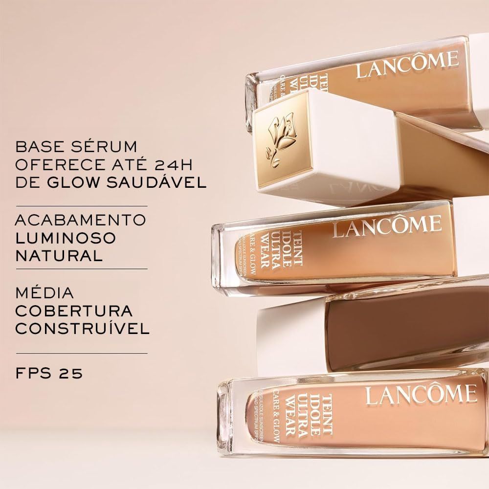 Mehrere Flakons. Text: Base Sérum, Acabamento Luminoso Natural, Média Cobertura, FPS 25. Lancôme Logo.