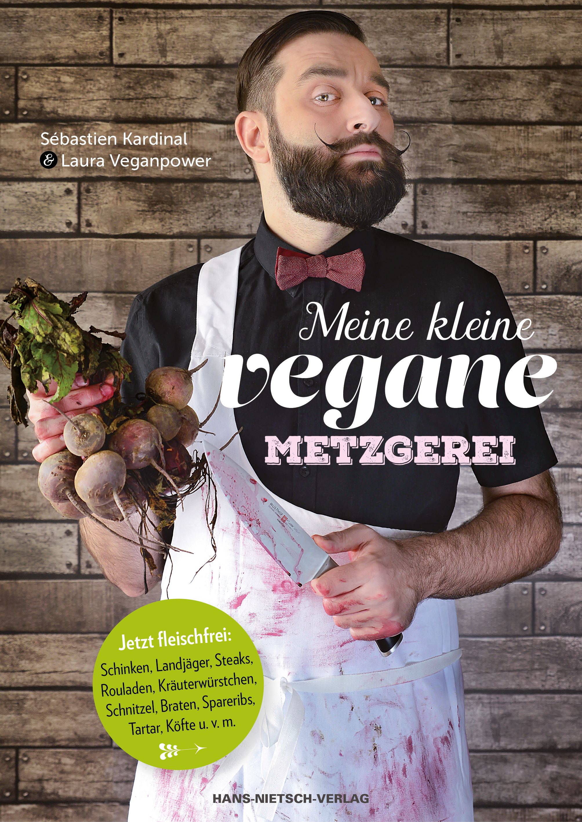Buchcover: "Meine kleine vegane Metzgerei". Mann mit Bart, Messer und Gemüse. Titel und Autorennamen sichtbar.