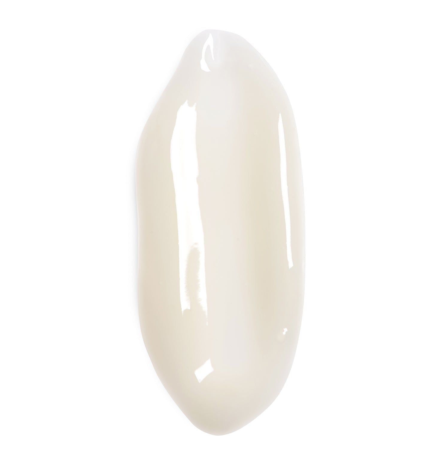 Nahaufnahme eines cremefarbenen Gels auf weißem Hintergrund. Glänzende Textur, längliche Form.