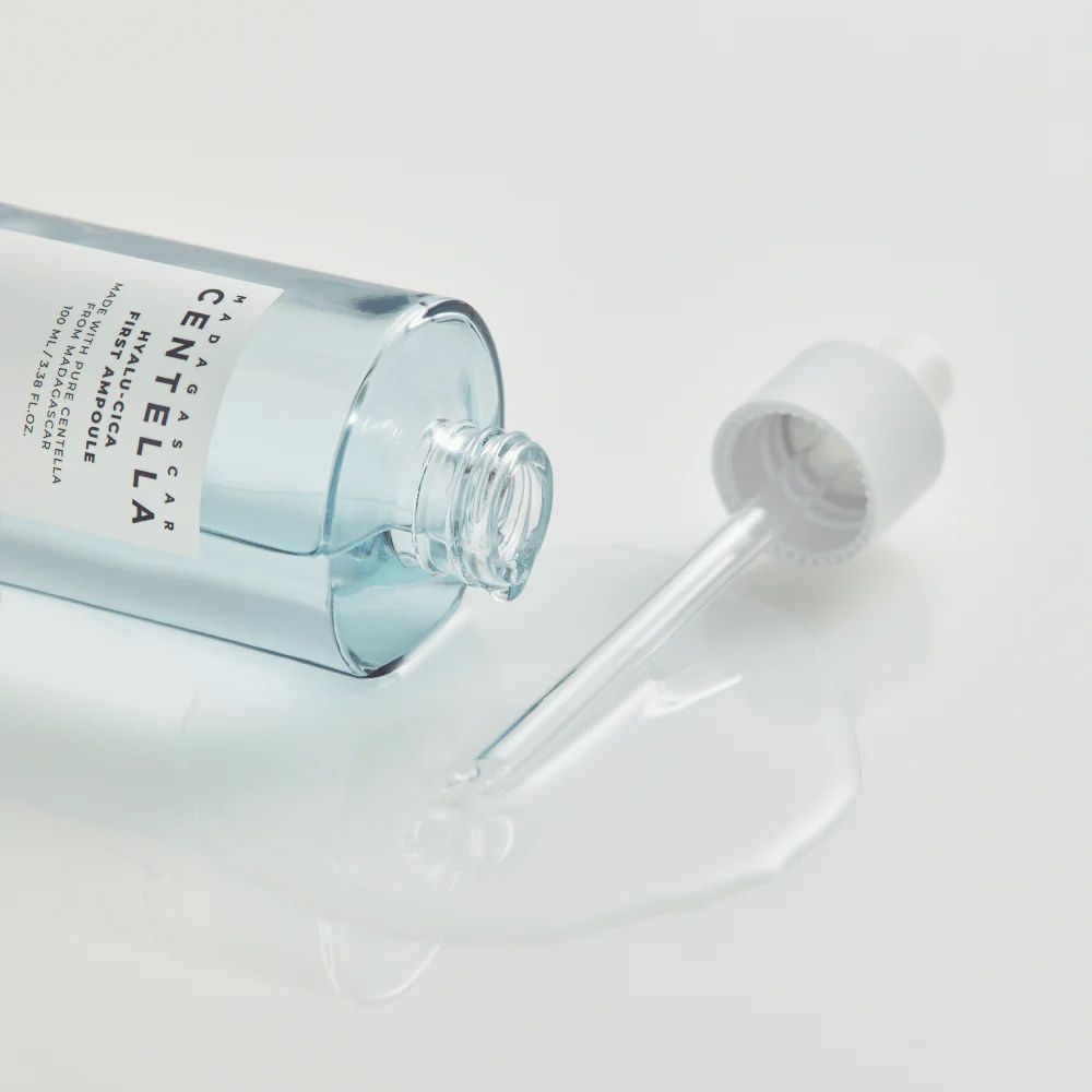 Flasche mit Pipette, Serum verschüttet.