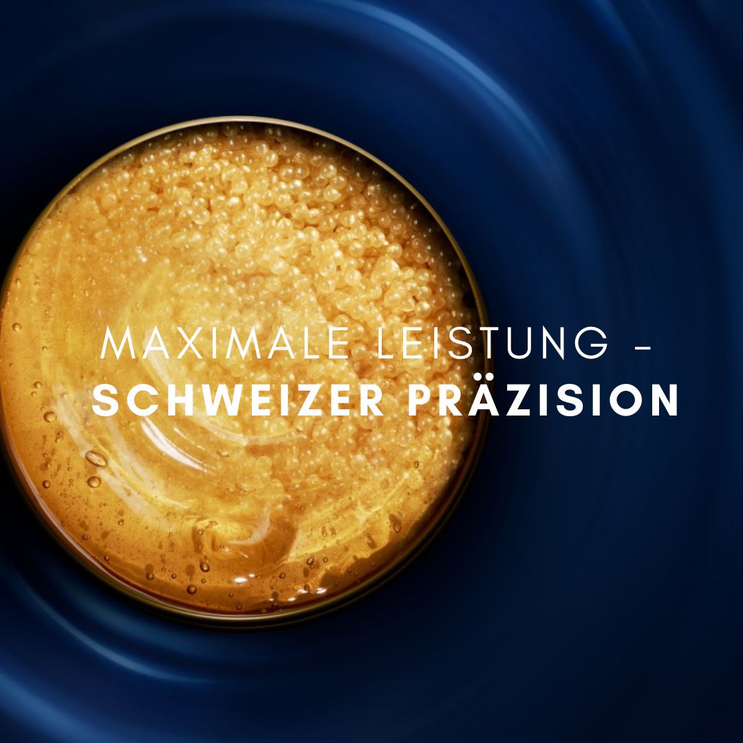 Dunkelblauer Hintergrund mit Text: MAXIMALE LEISTUNG - SCHWEIZER PRÄZISION. Goldfarbene Flüssigkeit.