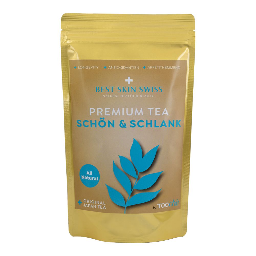 Goldfarbene Verpackung mit Aufschrift "Premium Tea Schön & Schlank". Blaue Blattform und Text "Best Skin Swiss".