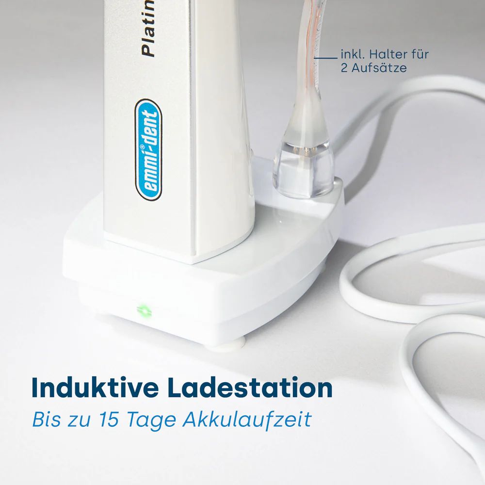 Induktive Ladestation. Zahnbürste und Ladekabel. Text: Bis zu 15 Tage Akkulaufzeit.