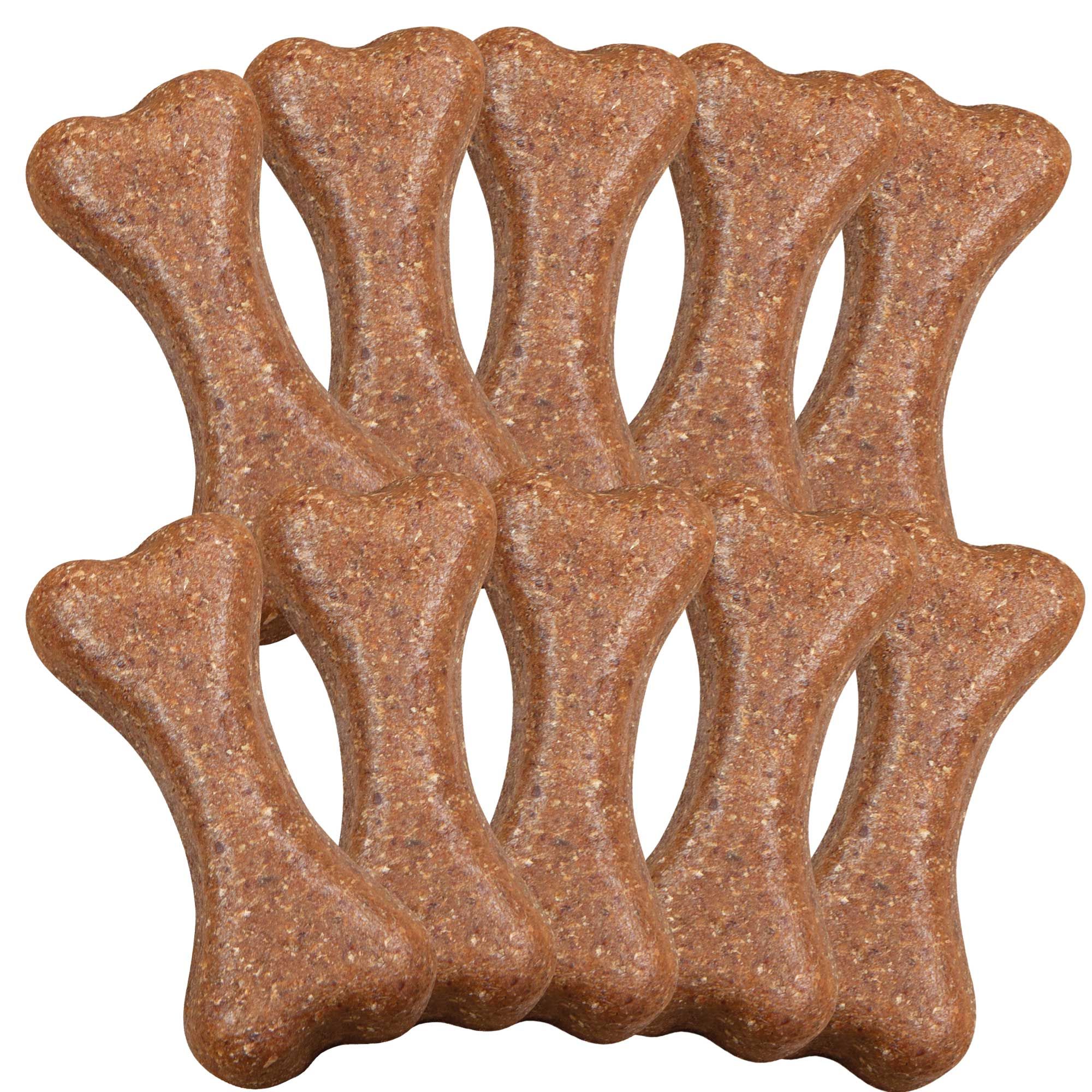 Mehrere Kauknochen in Knochenform. Helle und dunkle Farbtöne. Auf weißem Hintergrund.