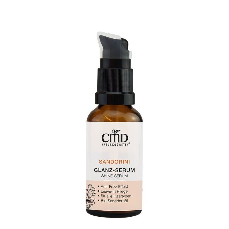 Flacone di vetro marrone con erogatore nero. Scritta: CMD Naturkosmetik, Sandorini Glanz-Serum. Contiene effetto anti-crespo, leave-in.