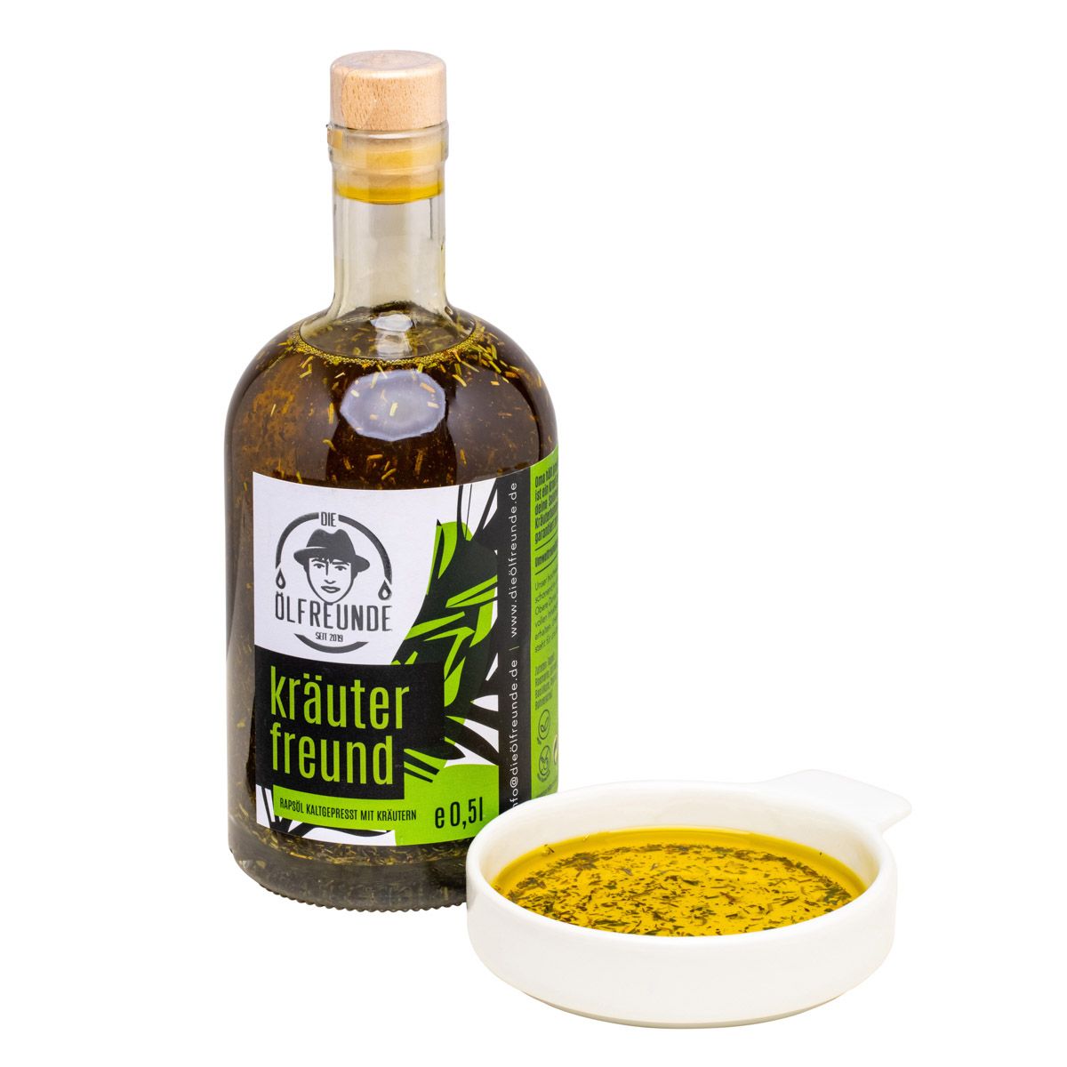 Glasflasche Kräuterfreund mit Schale. Schale gefüllt mit Flüssigkeit. Logo: Die Ölfreunde. Holzverschluss.