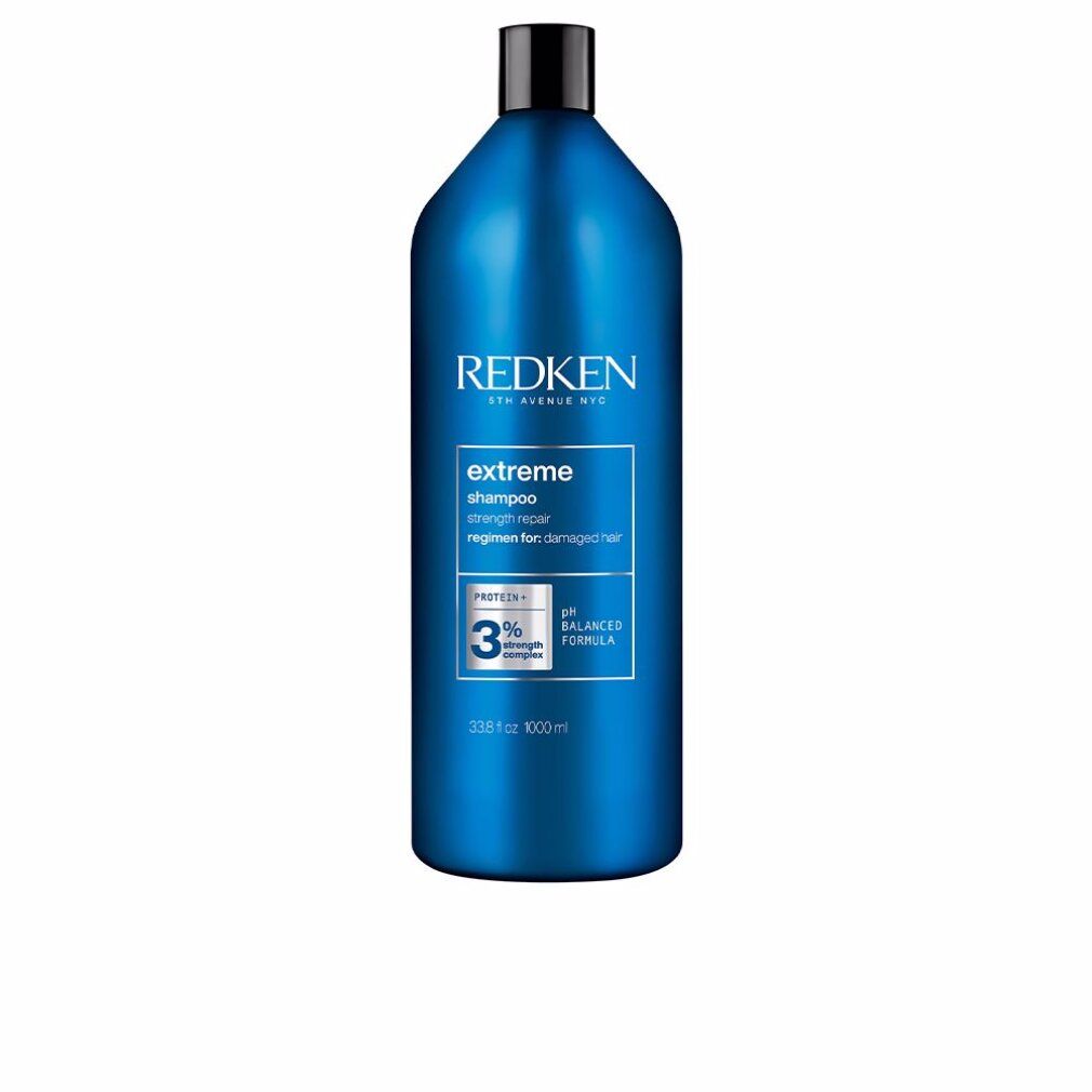 Blaue Flasche Redken Extreme Shampoo. Schwarzer Deckel. Text: Extreme Shampoo, pH-ausgewogene Formel, 1000 ml.