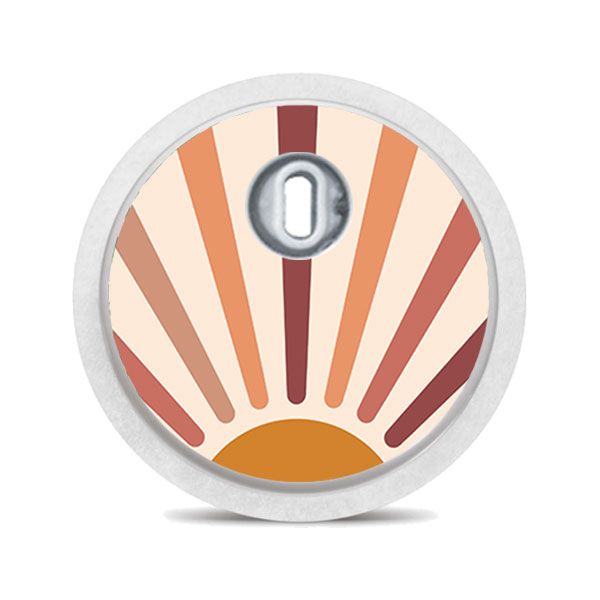 Runder Aufkleber mit Sonnenstrahlen. Beige, braune Farbtöne. Für medizinische Geräte.