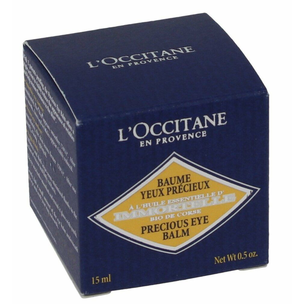 Dunkelblaue Schachtel mit Produktnamen und Logo. Text: Baume Yeux Précieux, Immortelle, Precious Eye Balm. 15 ml.