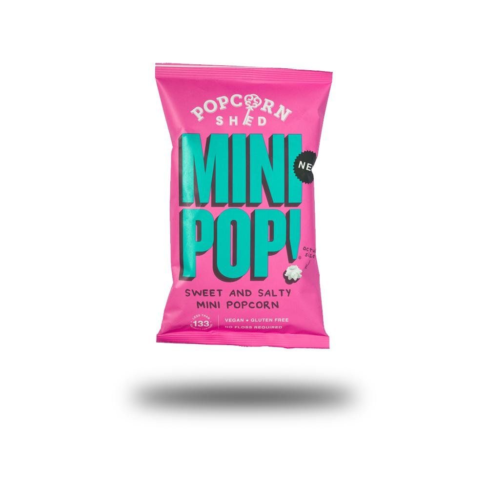 Rosa Tüte mit Popcorn Shed Mini Pop! Süß & Salzig. Text: Vegan, glutenfrei. Neues Produkt. Abgebildet ist eine Tüte.