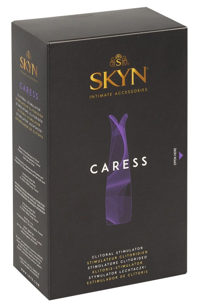 Schwarze Verpackung mit Produktabbildung. SKYN und CARESS-Logo. Text in mehreren Sprachen.