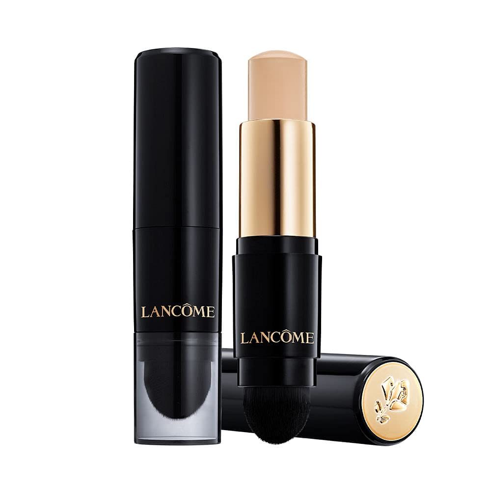 Lancôme Teint Idole Ultra Wear Foundation Stick. Zwei Stifte, einer mit Schwamm, einer mit Deckel. Logo und Produktname sichtbar.