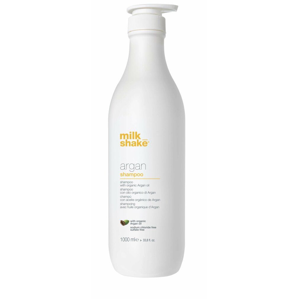 Weiße Flasche mit gelbem Etikett. Aufschrift: Milk_shake argan shampoo. Mit Arganöl. 1000 ml.