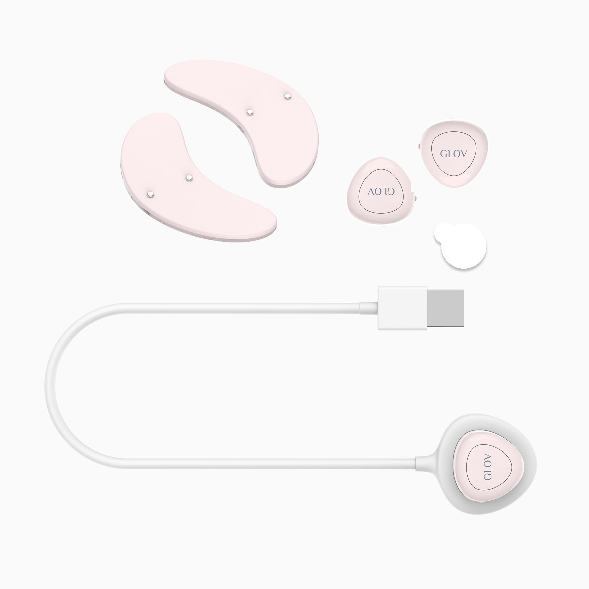 Zwei weiße GLOW-Augenpads, zwei Module und ein Ladekabel.