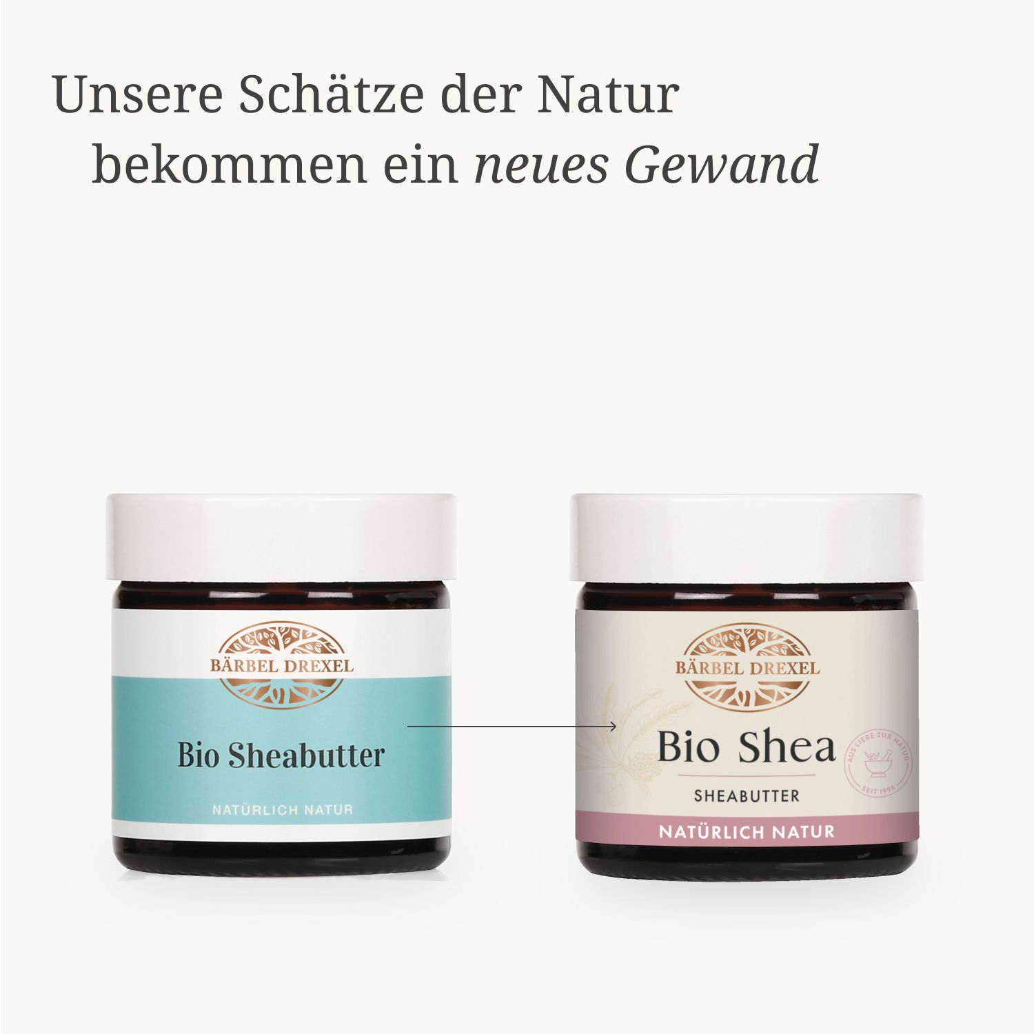 Zwei Bärbel Drexel Bio Shea Sheabutter Produkte nebeneinander, eines mit blauem und eines mit rosa Etikett.