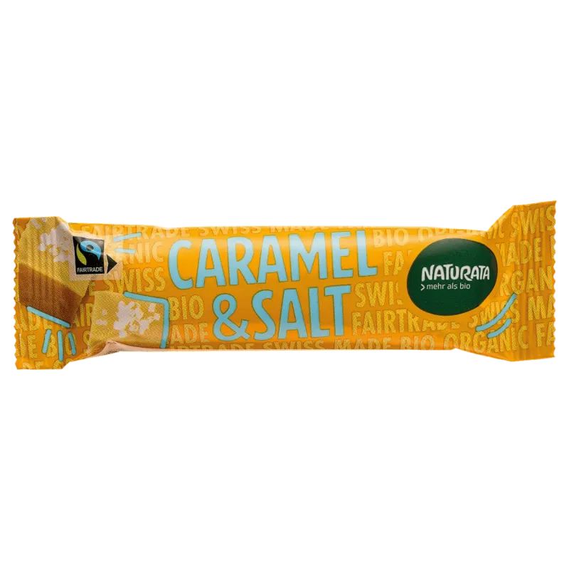 Verpackung eines Schokoriegels mit Aufschrift "CARAMEL & SALT". Marke Naturata, Fairtrade-Siegel.