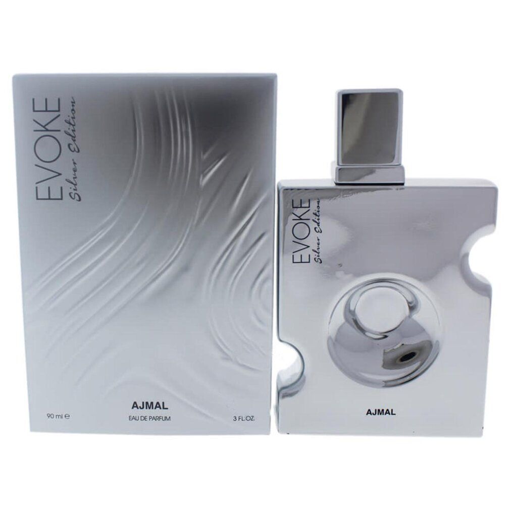 Silberne Flasche und Verpackung. Auf der Verpackung steht 'EVOKE Silver Edition' und 'AJMAL'. Auf der Flasche steht ebenfalls 'EVOKE'.
