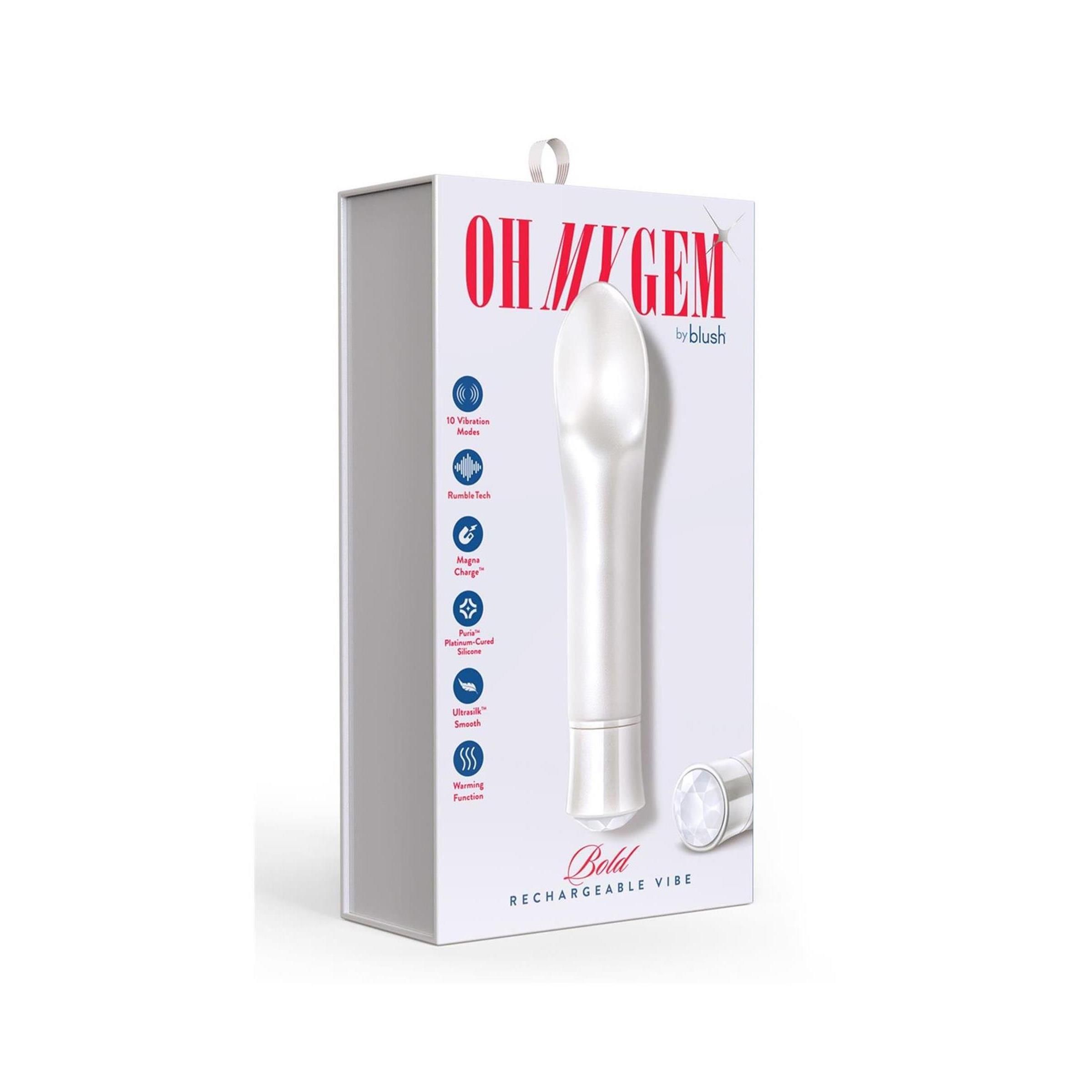 Verpackung mit Wellness-Produkt. Aufschrift: OH MY GEM in Blush, Bedd Rechargeable Vibe. Produkt mit abgerundetem Kopf.