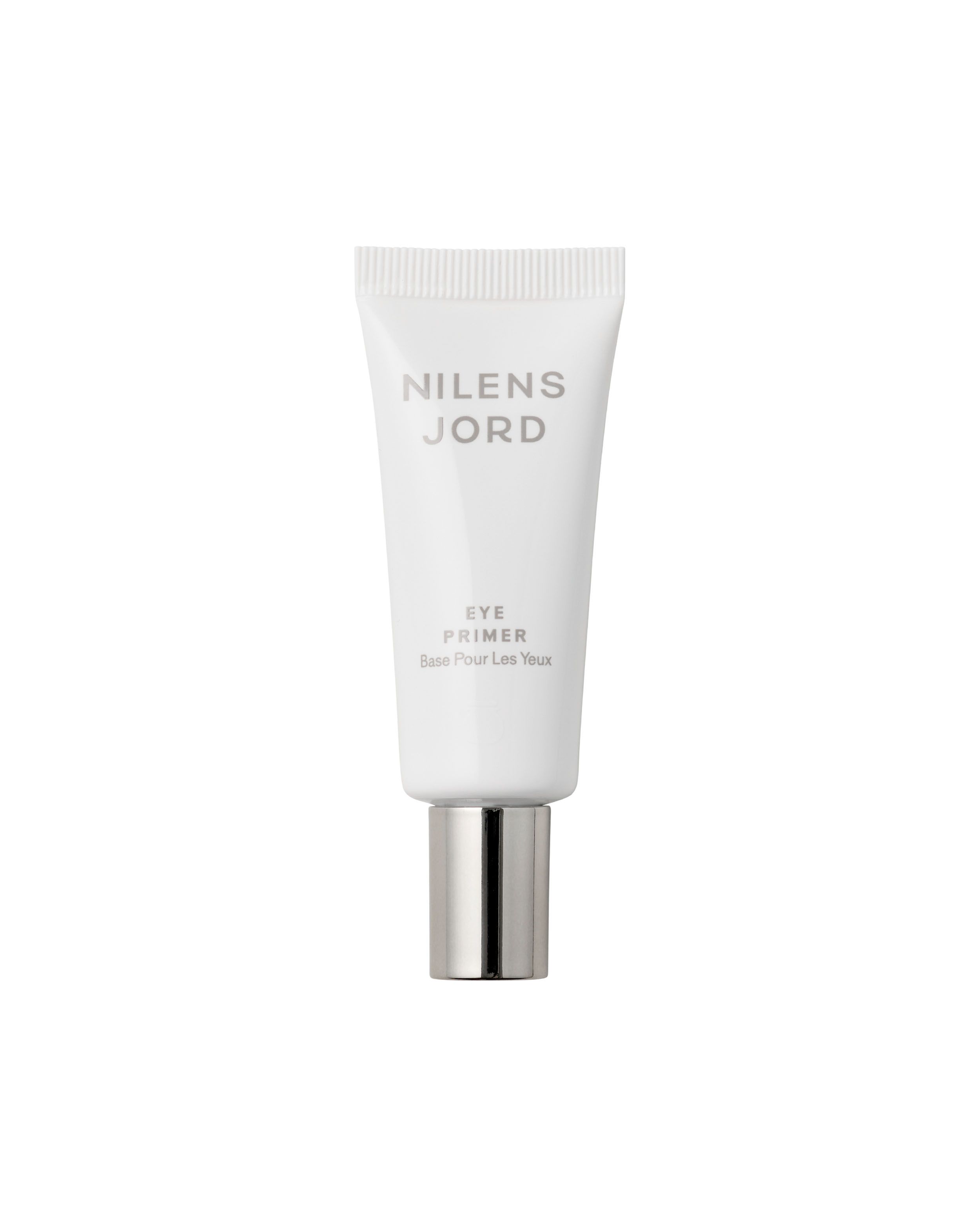 Weiße Tube mit silbernem Verschluss. Beschriftung: NILENS JORD EYE PRIMER.