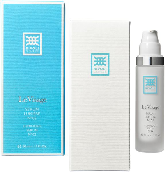 Serumflasche und zwei Verpackungen. Aufschrift: Le Visage Sérum Lumière N°02. Flasche mit silbernem Deckel. Verpackungen blau und weiß.