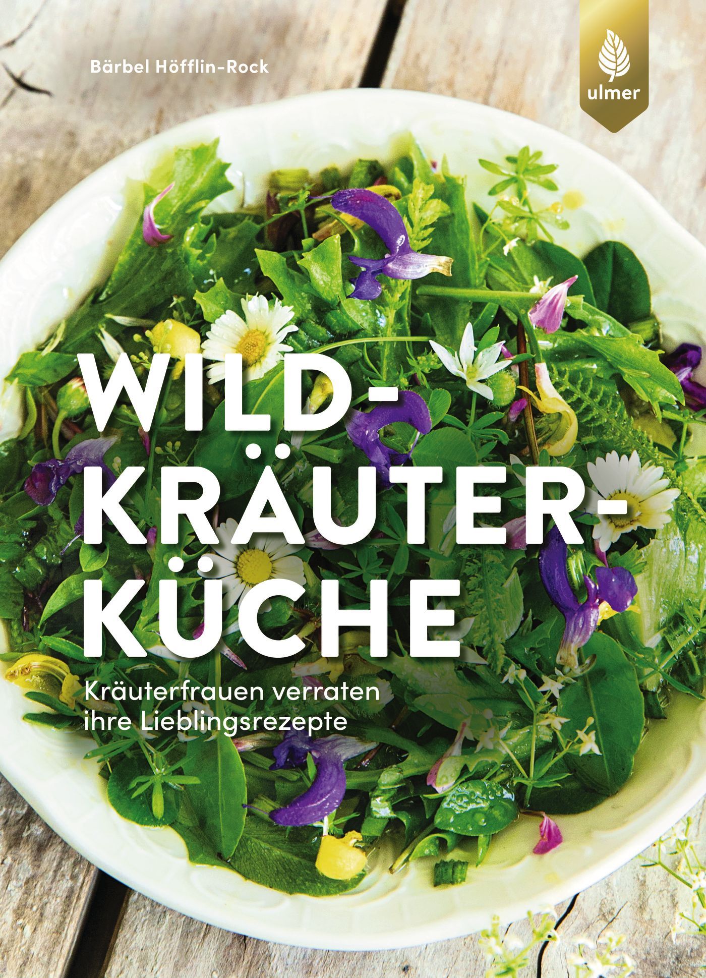 Buchcover mit Salat und Wildblumen. Titel: Wildkräuterküche. Autor: Bärbel Höfflin-Rock. Verlag: Ulmer. Rezepttitel unten.