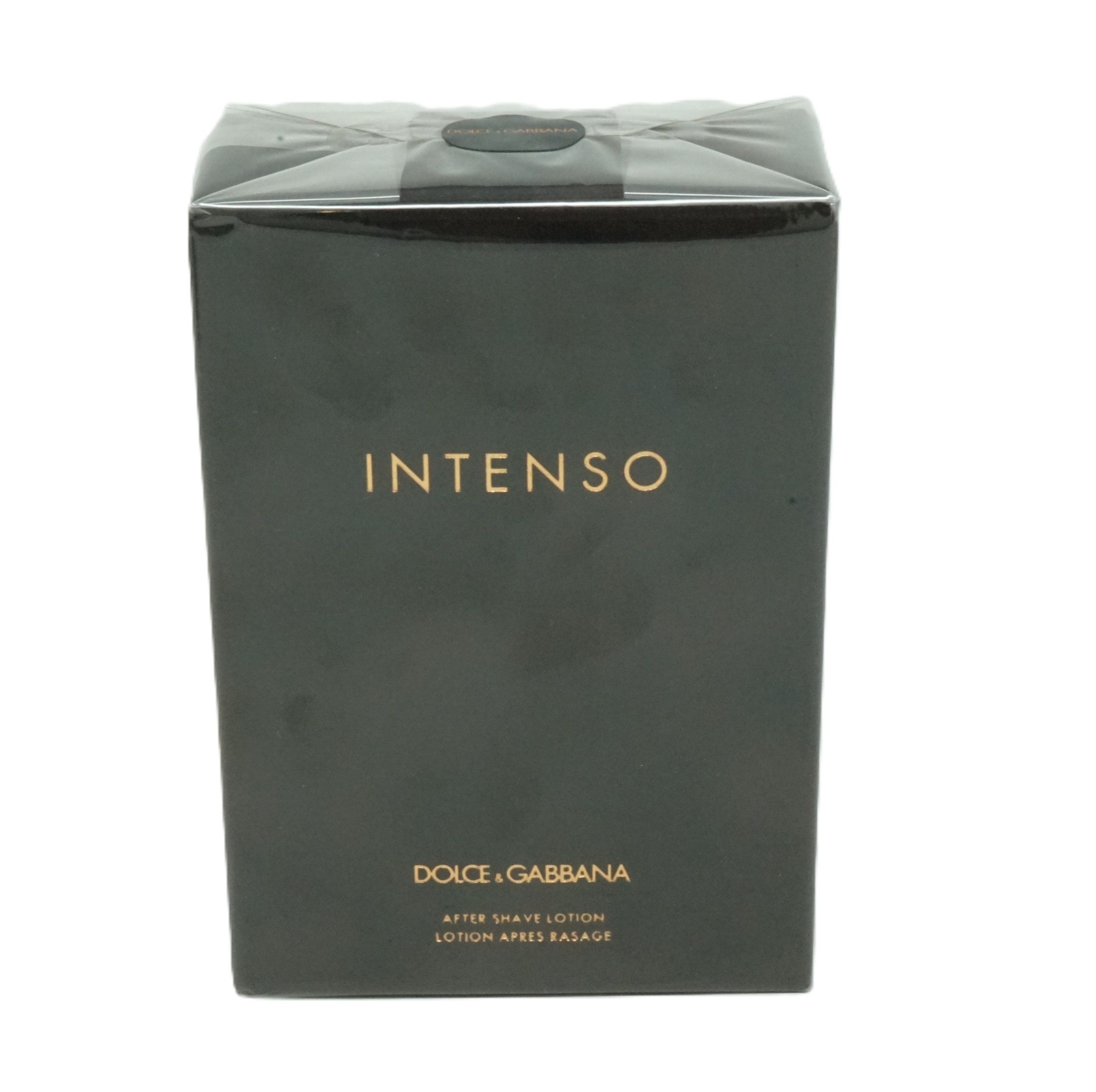 Dunkelgrüne Verpackung von Dolce & Gabbana Intenso After Shave Lotion. Goldfarbener Schriftzug INTENSO. Unterhalb steht DOLCE & GABBANA.