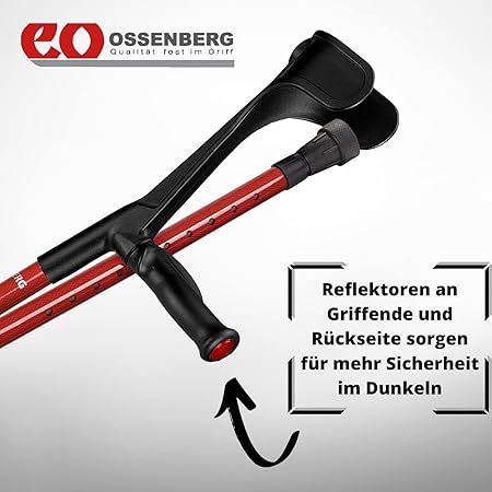 Gehhilfe, rot und schwarz. Schwarzer Griff und Armauflage. Rotes Stützrohr. Reflektoren. Text: OSSENBERG. Text: Reflektoren an Griffende und Rückseite sorgen für mehr Sicherheit im Dunkeln.