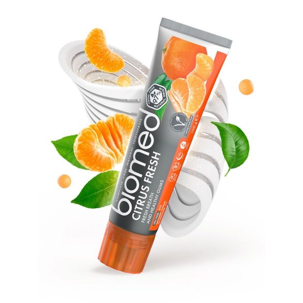 Zahnpasta-Tube Biomed Citrus Fresh mit Mandarinen und Blättern. Orangefarbener Verschluss.