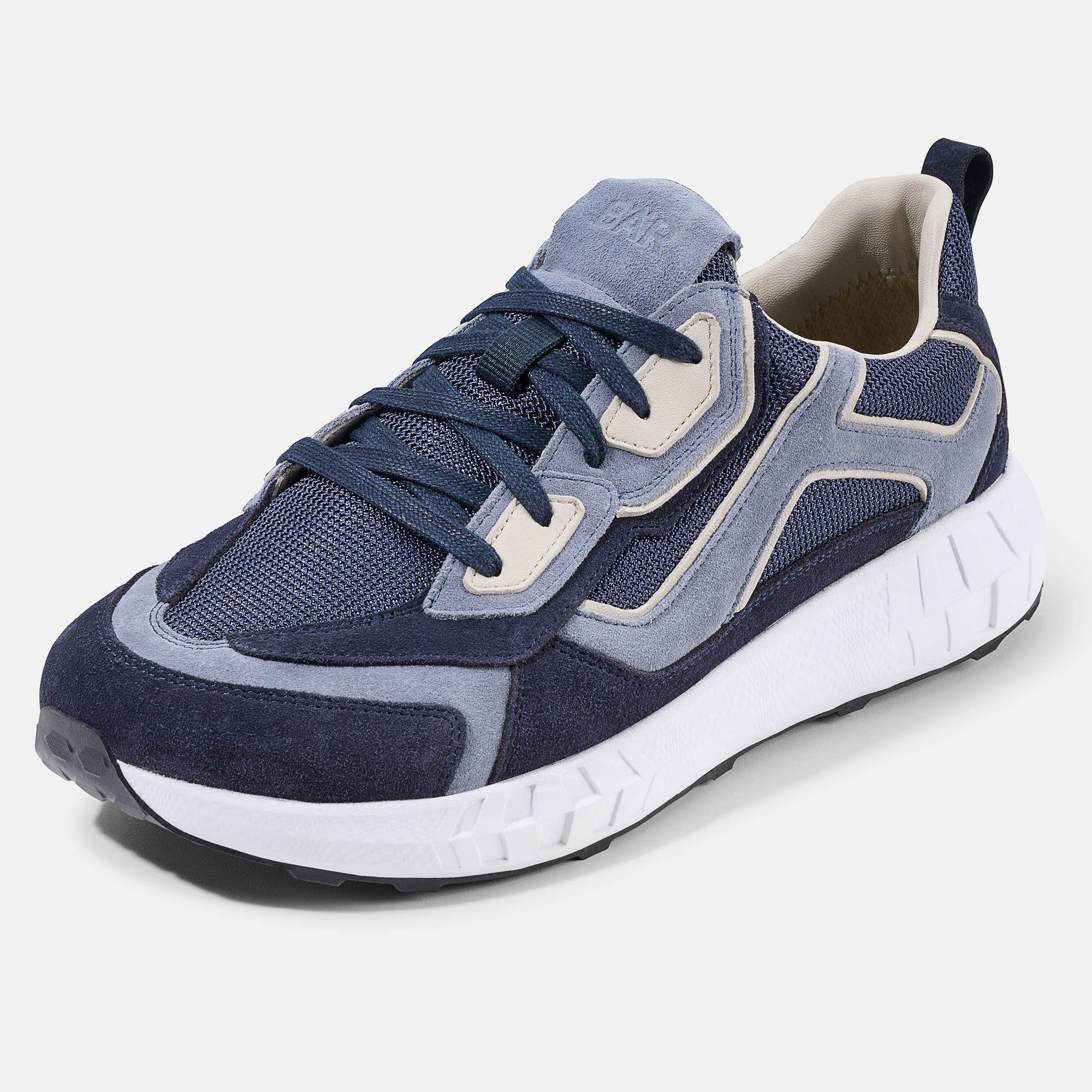 Blauer Schnürschuh mit weißer Sohle. Graue und beige Details. Marke BÄR auf der Zunge.