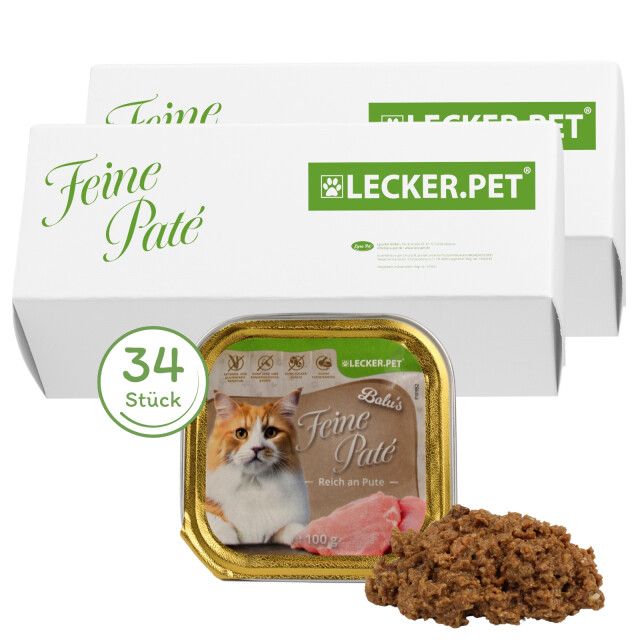 Zwei Kartons mit Katzenfutter. Eine Dose und Futter daneben. Aufschrift: Feine Paté, Lecker.Pet, 34 Stück.