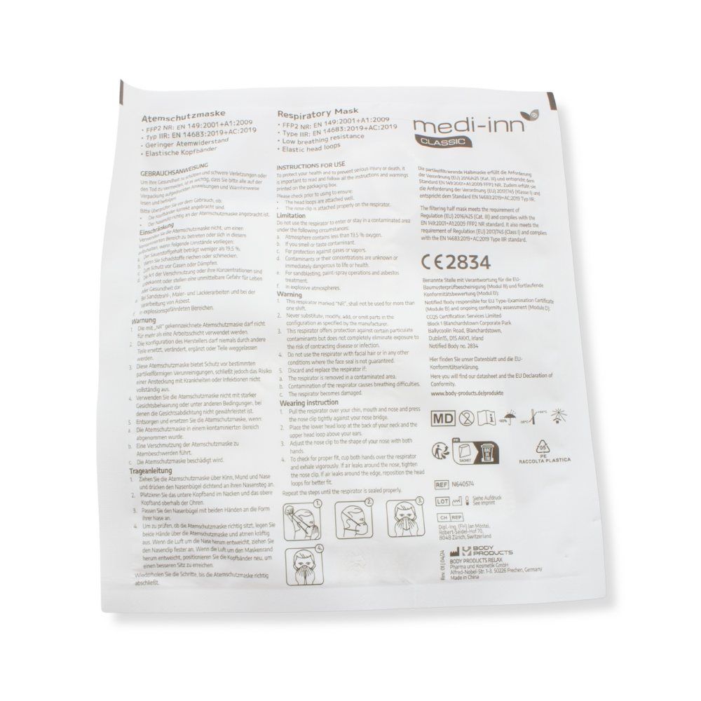 Verpackung mit Informationen zur Atemschutzmaske. Aufschrift: medi-inn, CE 2834. Anweisungen und Piktogramme.
