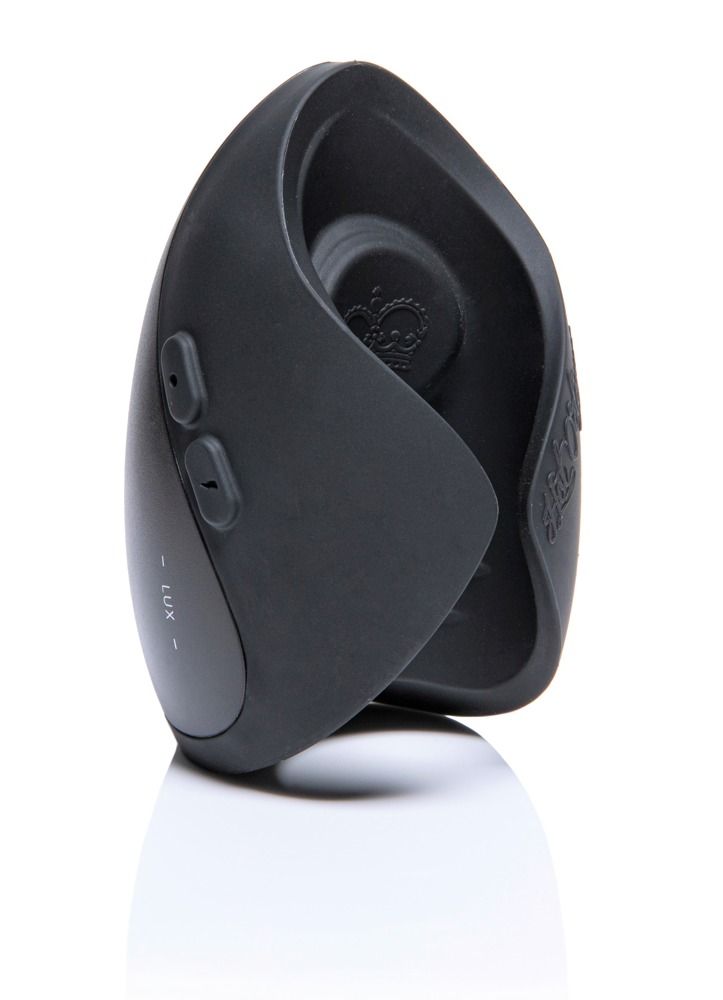 Schwarzes, ovales Gerät. Zwei Knöpfe, Text: - LUX -.