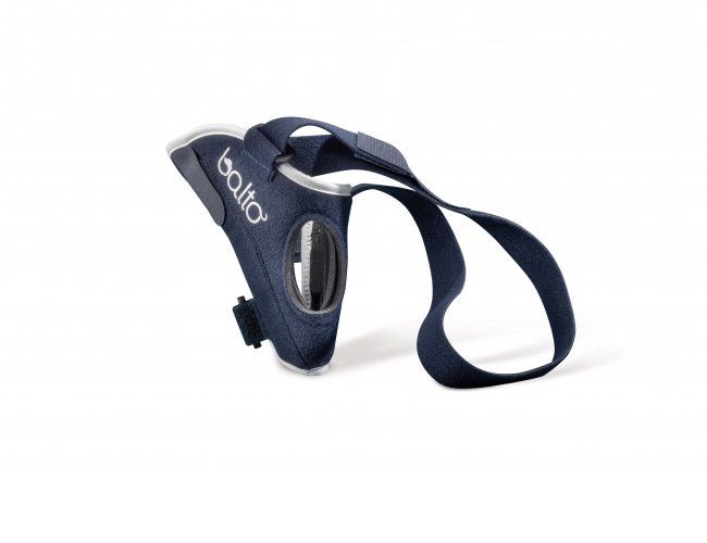 Dunkelblaue Kniebandage für Hunde. Mit Klettverschluss und Band. Der Schriftzug "balto" ist sichtbar.