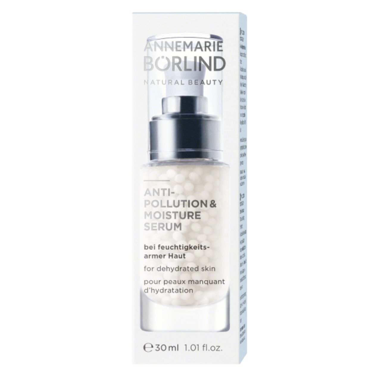 Serumflasche mit silbernem Pumpkopf. Text: ANNEMARIE BÖRLIND, ANTI-POLLUTION & MOISTURE SERUM. Für trockene Haut.