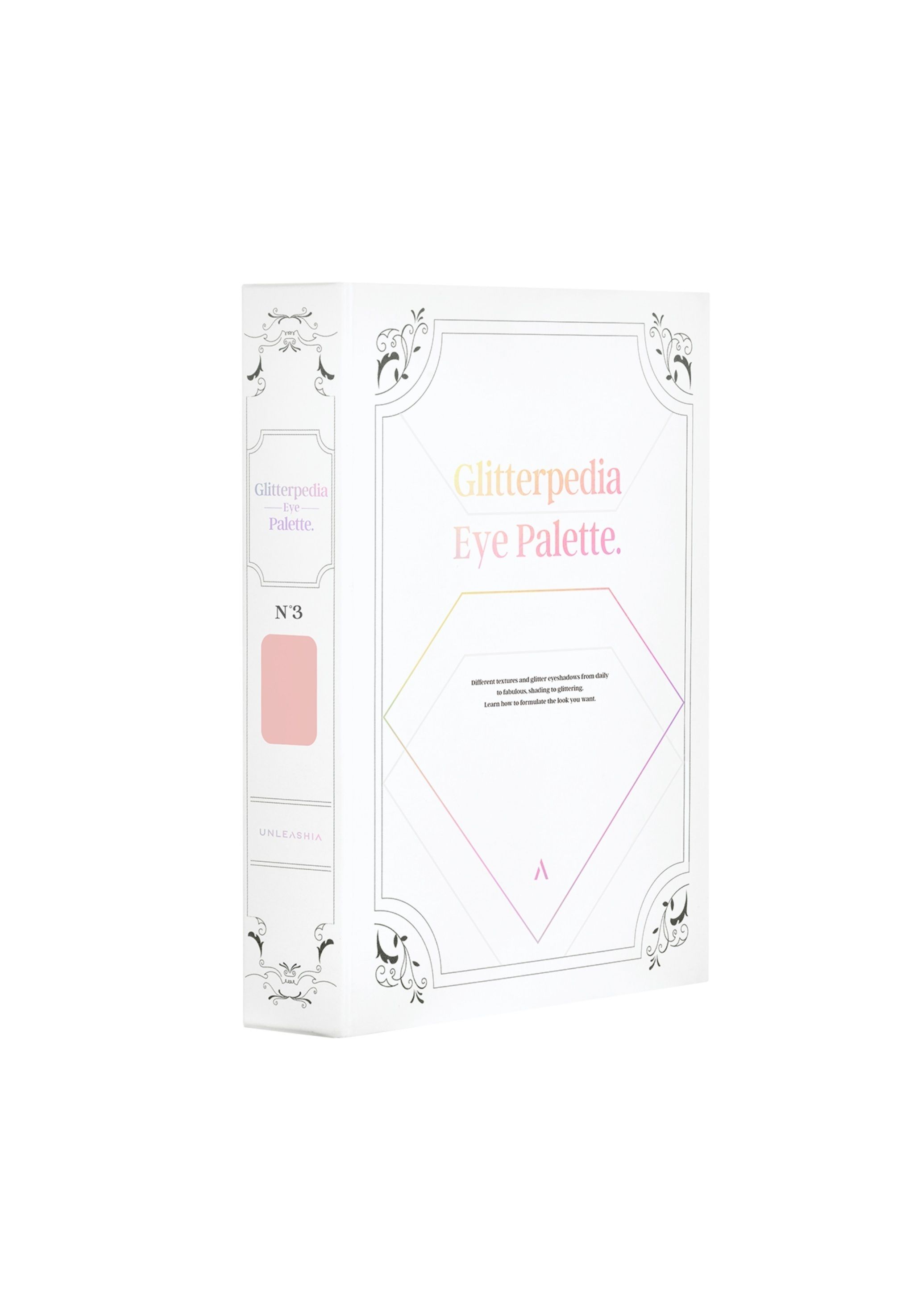 Glitterpedia Eye Palette N°3. Weiße Verpackung im Buchstil. Aufschrift: Glitterpedia Eye Palette. Rosa Farbblock.