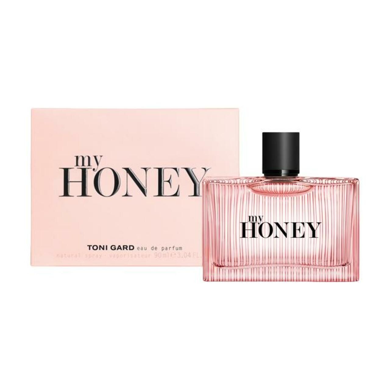 Rosa Parfumflasche und Schachtel. Aufschrift "my HONEY". Schwarzer Verschluss. "TONI GARD" und "Eau de Parfum" auf der Schachtel.
