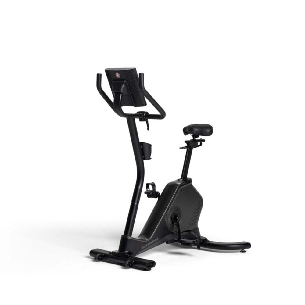Schwarzer Hometrainer. Konsole, Lenker, Sitz und Pedale sichtbar. Schwinn-Logo auf Konsole.