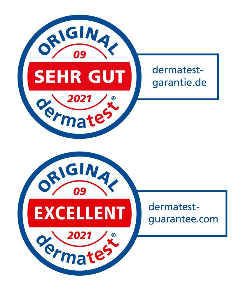 Zwei dermatest-Siegel. Oben: Sehr Gut. Unten: Excellent. Blaue Kreise mit weißem Text.