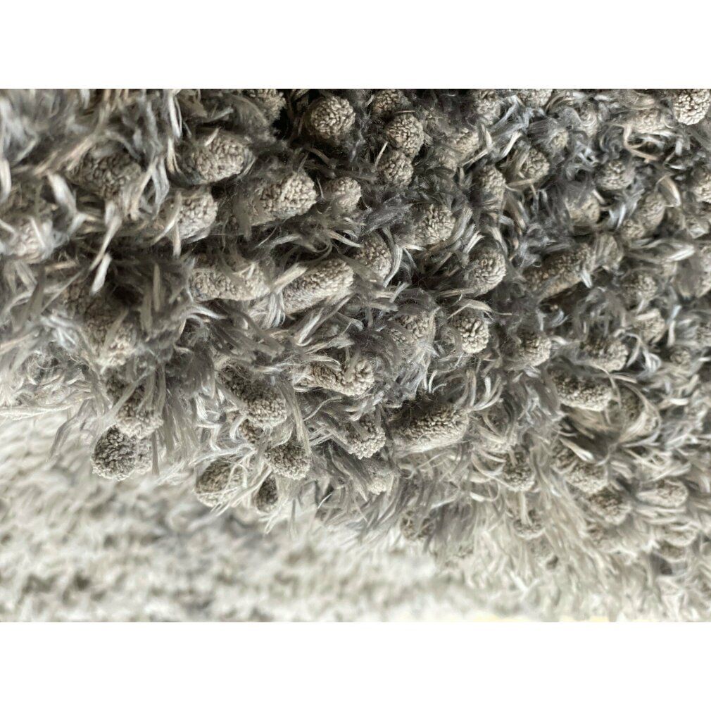 Nahaufnahme von Royal Dry Doormat m. Grauer, flauschiger Teppich. Strukturierte Oberfläche.