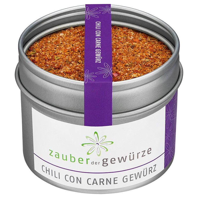 Runde Dose mit Zauber der Gewürze Chili con Carne Gewürz. Weißes Etikett, lila Band mit Text. Gewürzmischung sichtbar.