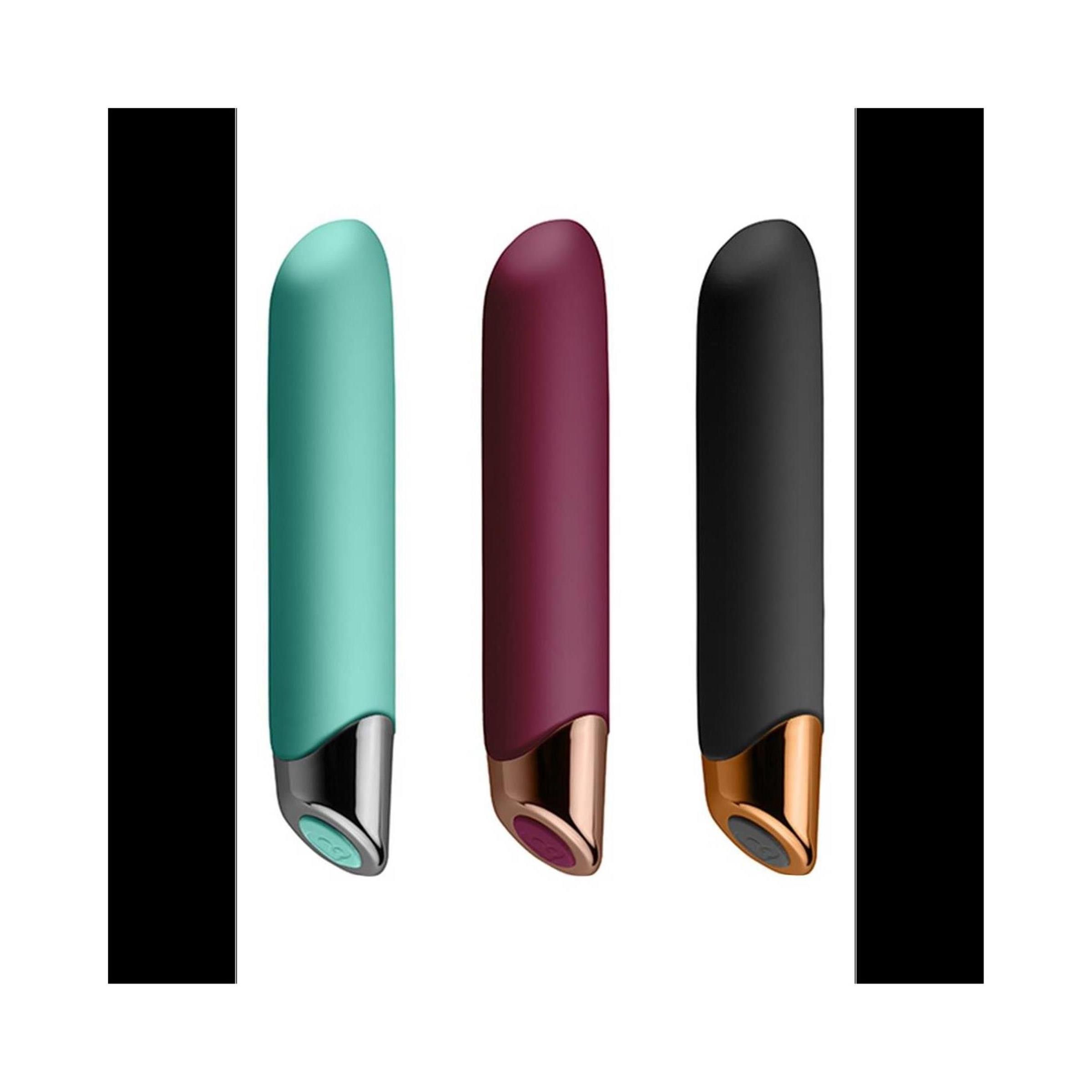 Drei Vibratoren: Türkis, Burgunderrot und Schwarz. Goldfarbene und silberfarbene Akzente.