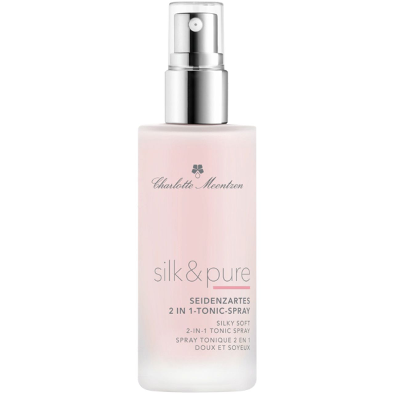 Seidenzartes 2 in 1-Tonic-Spray Silk & Pure in einem rosafarbenen Glasflakon mit silbernem Pumpspender.